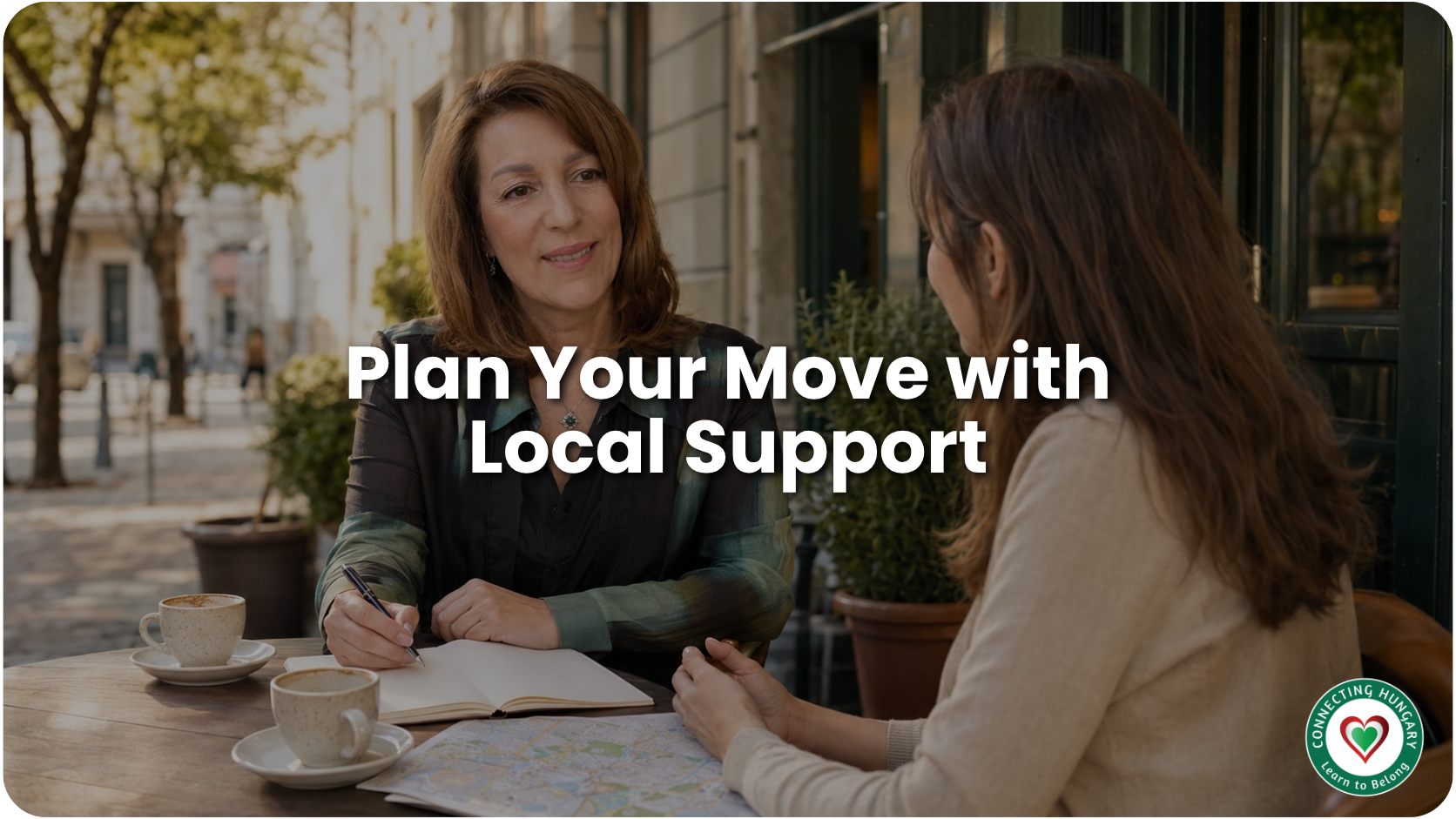 Magdolna discussing relocation plans with a client over coffee at a Budapest street café.
